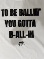White "ALL-IN" T-shirt by NBASayLessDoMore, featuring a classic crew neck and simple design on a flat lay.