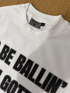 White "ALL-IN" T-shirt by NBASayLessDoMore, front view showcasing the plain white cotton tee with "ALL-IN" graphic.